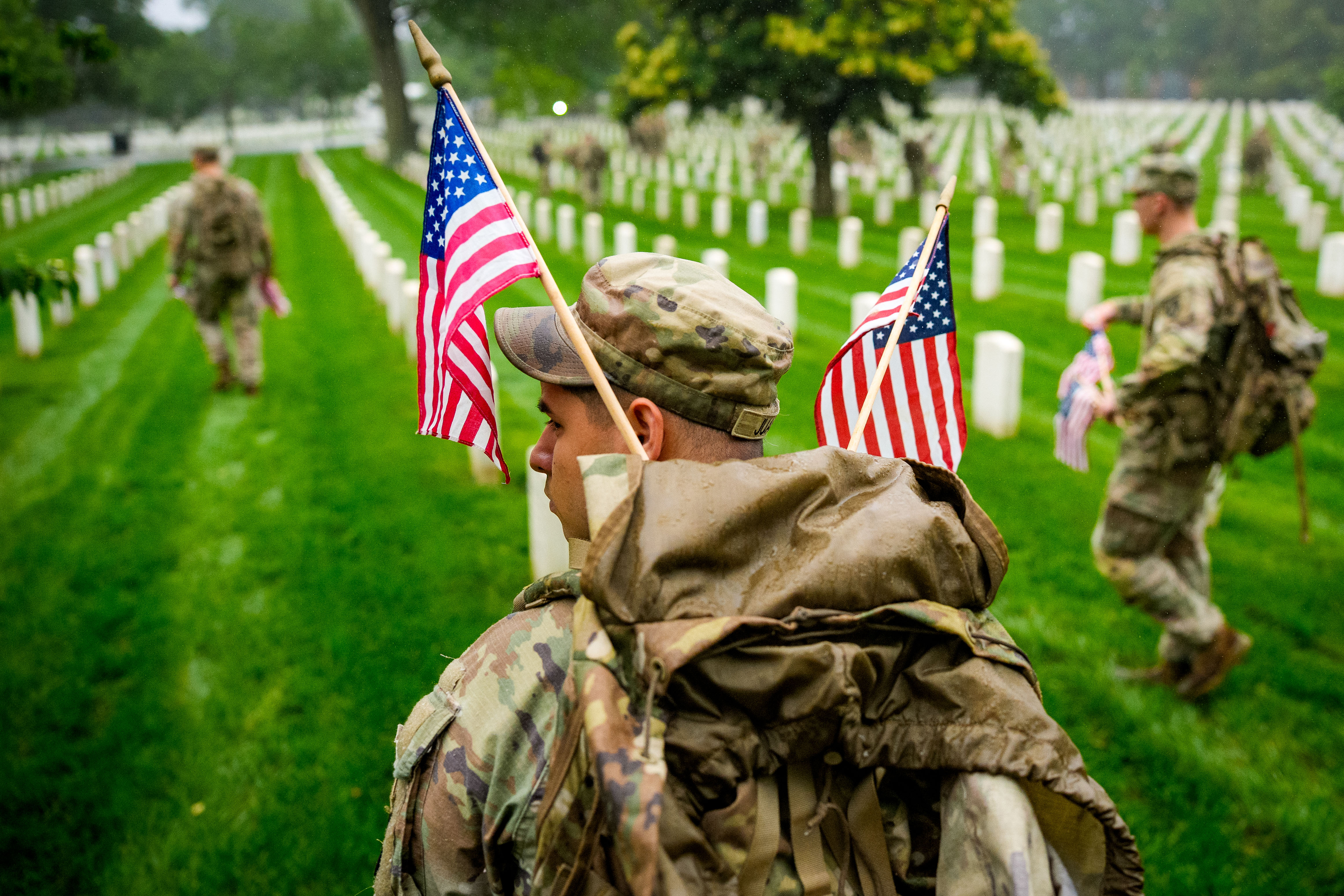 Day in Photos: Memorial Day, Plane Crash, and Renaissance Exhibition