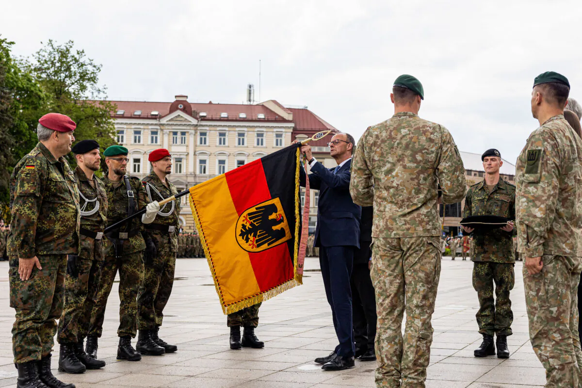 German Chancellor Friedrich Merz during a ceremony to address members of Germany's 45th Armored Brigade (Panzerbrigade 45) of the Bundeswehr at a ceremonial roll call in Vilnius, Lithuania, on May 22, 2025. (Paulius Peleckis/Getty Images)