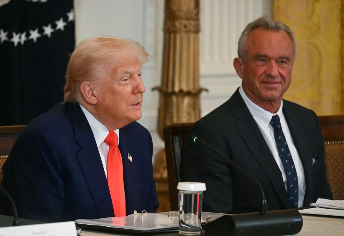 President Donald Trump speaks as Secretary of Health and Human Services Robert F. Kennedy Jr. looks on during a MAHA (Make America Healthy Again) Commission Event in the White House in Washington, DC, on May 22, 2025. (Jim Watson/AFP)