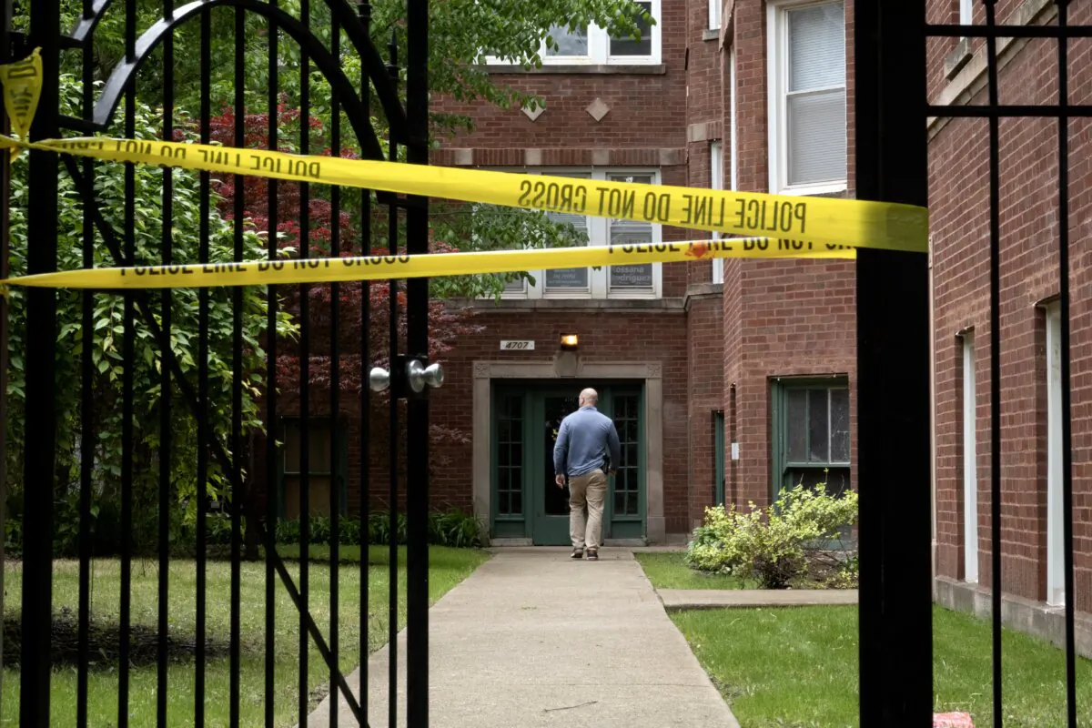 Law enforcement officials from the FBI, Joint Terrorism Task Force and Chicago Police participate in a search of the apartment where shooting suspect Elias Rodriguez lived, in Chicago on May 22, 2025. (Scott Olson/Getty Images)