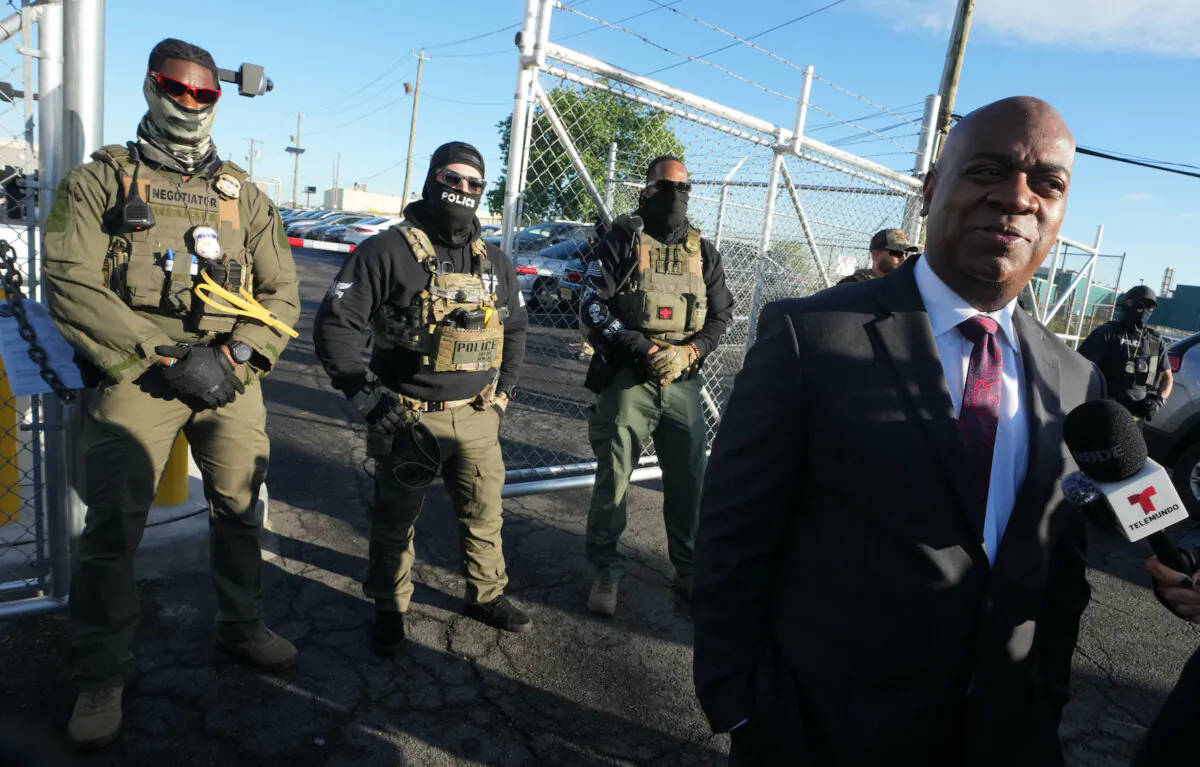 Mayor Ras Baraka of Newark speaks to the press near ICE agents at a demonstration outside an immigrant detention centre in Elizabeth, N.J., on May 7, 2025. (Timothy A. Clary/AFP via Getty Images)