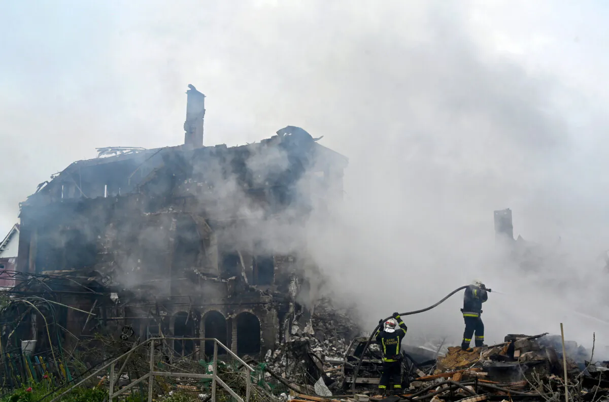 Firefighters extinguish a blaze following a Russian strike in the Kyiv region of Ukraine on May 25, 2025. (Sergei Supinsky/AFP via Getty Images)