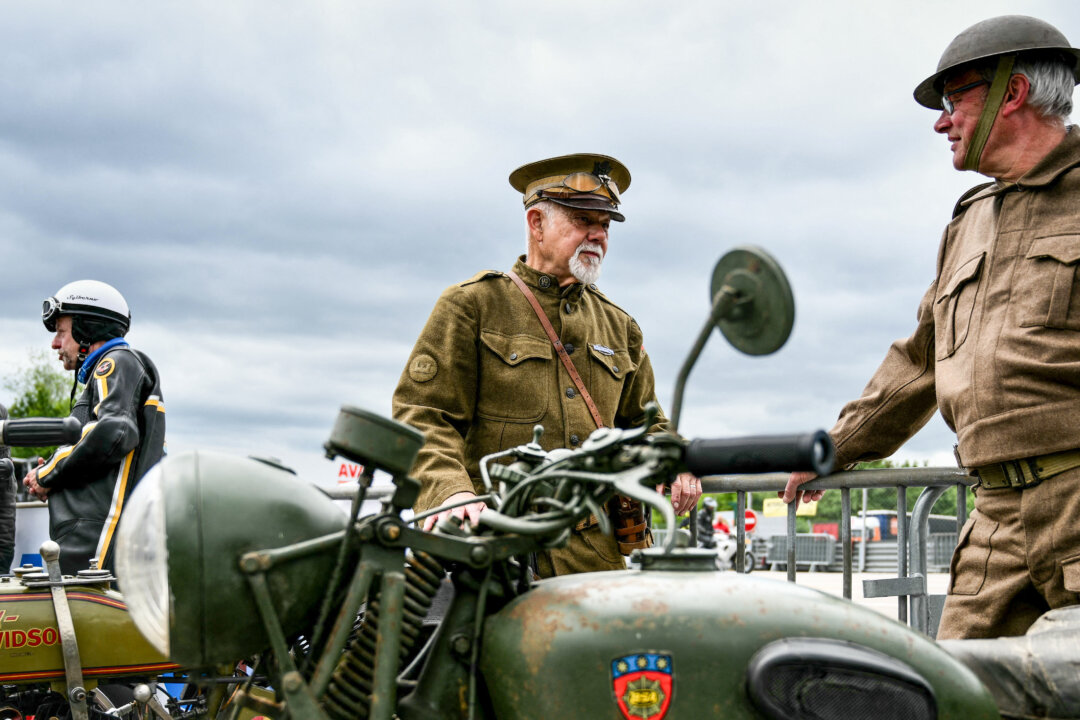 NextImg:Day in Photos: Vintage Motorcycle Race, Jerusalem Day, and Kristi Noem in Bahrain