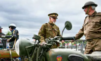 Day in Photos: Vintage Motorcycle Race, Jerusalem Day, and Kristi Noem in Bahrain