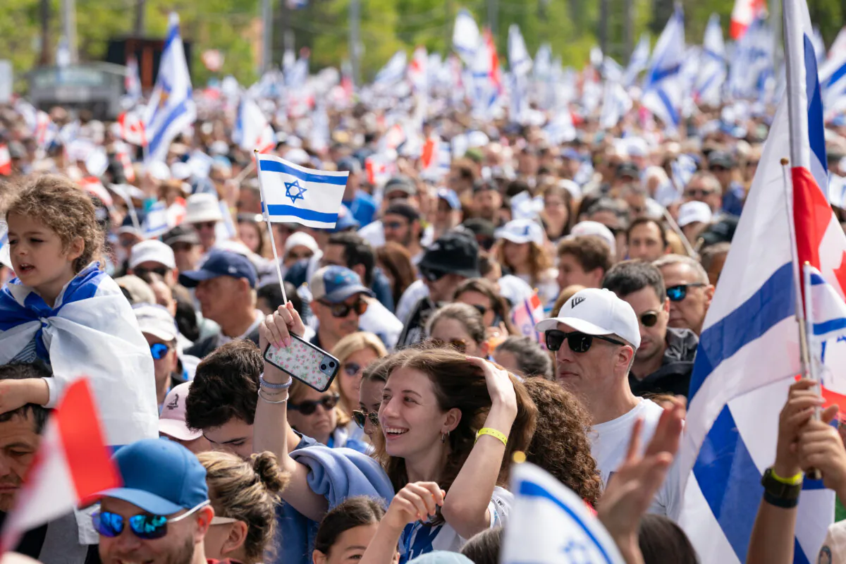 People participate in the United Jewish Appeal's annual Walk With Israel event in Toronto on May 25, 2025. (The Canadian Press/Arlyn McAdorey)