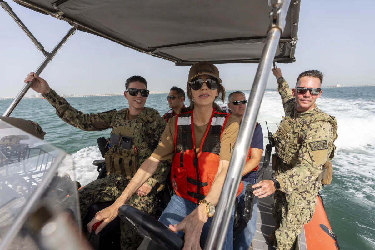 Homeland Security Secretary Kristi Noem (C) pilots an Over the Horizon Small Boat, Mark 4, off the coast of Manama, Bahrain, on May 25, 2025. (Alex Brandon/AP)