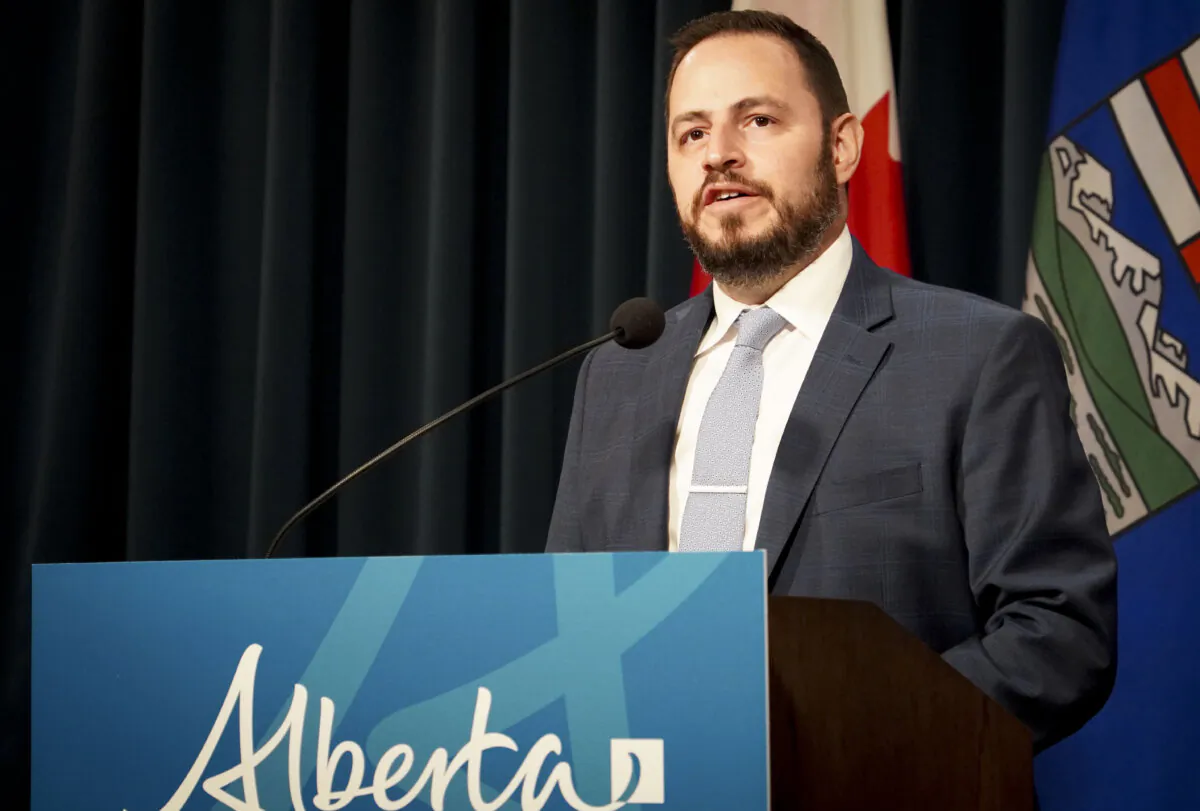Alberta Education Minister Demetrios Nicolaides speaks at a press conference in Calgary on May 26, 2025. (Carolina Avendano/The Epoch Times)
