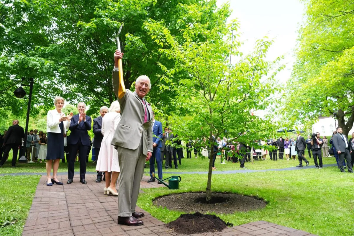 King Charles takes part in a tree-planting ceremony at Rideau Hall in Ottawa on May 26, 2025. (The Canadian Press/Sean Kilpatrick)