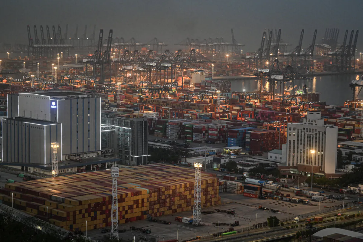 Shipping containers and gantry cranes at the Yantian port at night in Shenzhen, Guangdong Province, China, on April 14, 2025. (Jade Gao/AFP via Getty Images)