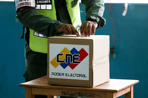 A member of the National Guard casts his vote during regional elections at a polling station in El Dorado, Bolivar State, Venezuela, on May 25, 2025. (Pedro Mattey/AFP via Getty Images)
