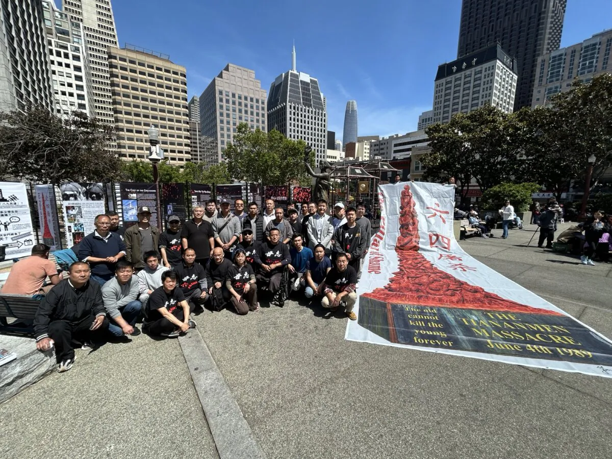Chinese pro-democracy activists gather in Portsmouth Square in San Francisco on May 25, 2025, to commemorate the victims of the Tiananmen Square Massacre. (Nathan Su/The Epoch Times)