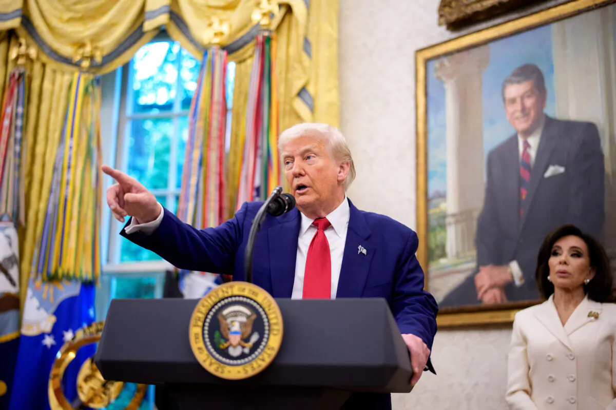 President Donald Trump takes a question during a swearing-in ceremony for interim U.S. Attorney for Washington Jeanine Pirro (R) in the Oval Office on May 28, 2025. (Andrew Harnik/Getty Images)