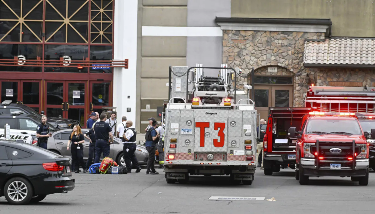 Waterbury police and emergency first responders are at Brass Mill Center, where several people were shot on Tuesday afternoon, in Waterbury, Conn., on May 27, 2025. (Jim Shannon/Hearst Connecticut Media via AP)