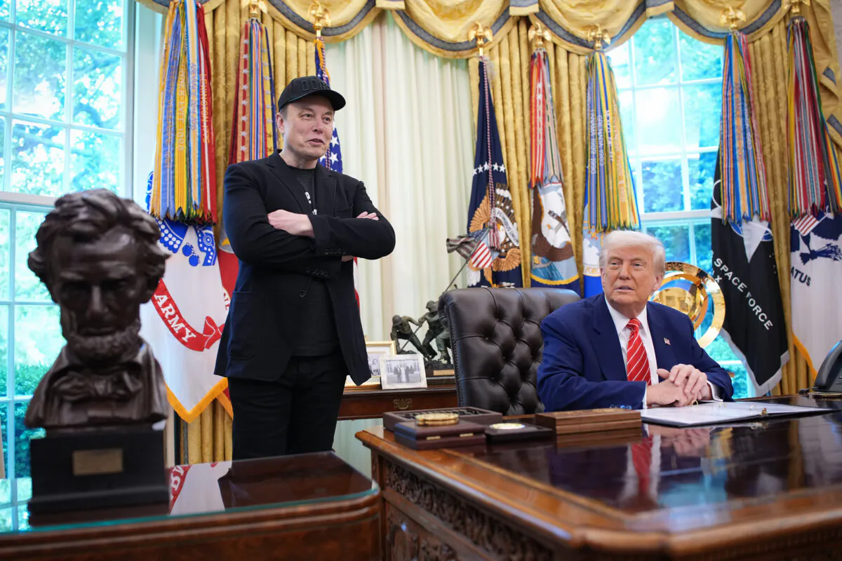 President Donald Trump, joined by Tesla CEO Elon Musk, speaks to reporters in the Oval Office on May 30, 2025. (Kevin Dietsch/Getty Images)