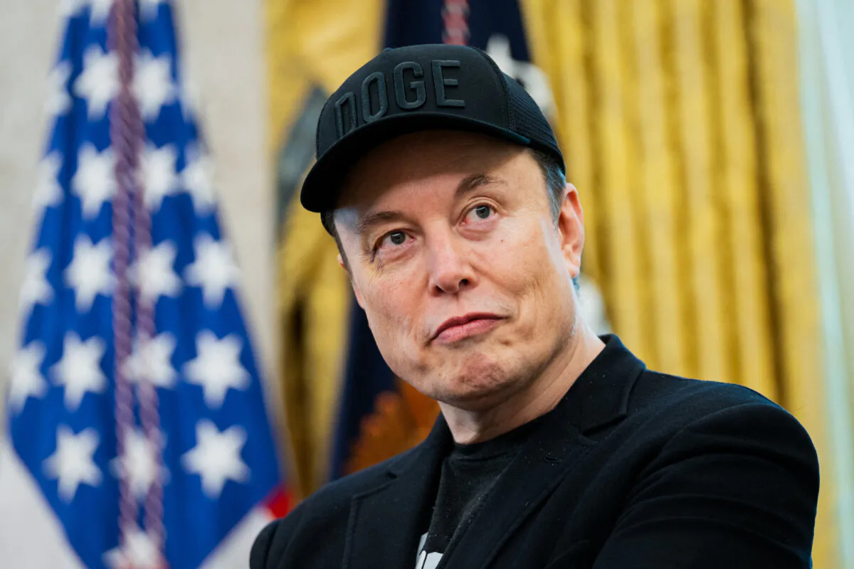 Elon Musk looks on during a news conference in the Oval Office of the White House on May 30, 2025. (Allison Robbert/AFP via Getty Images)