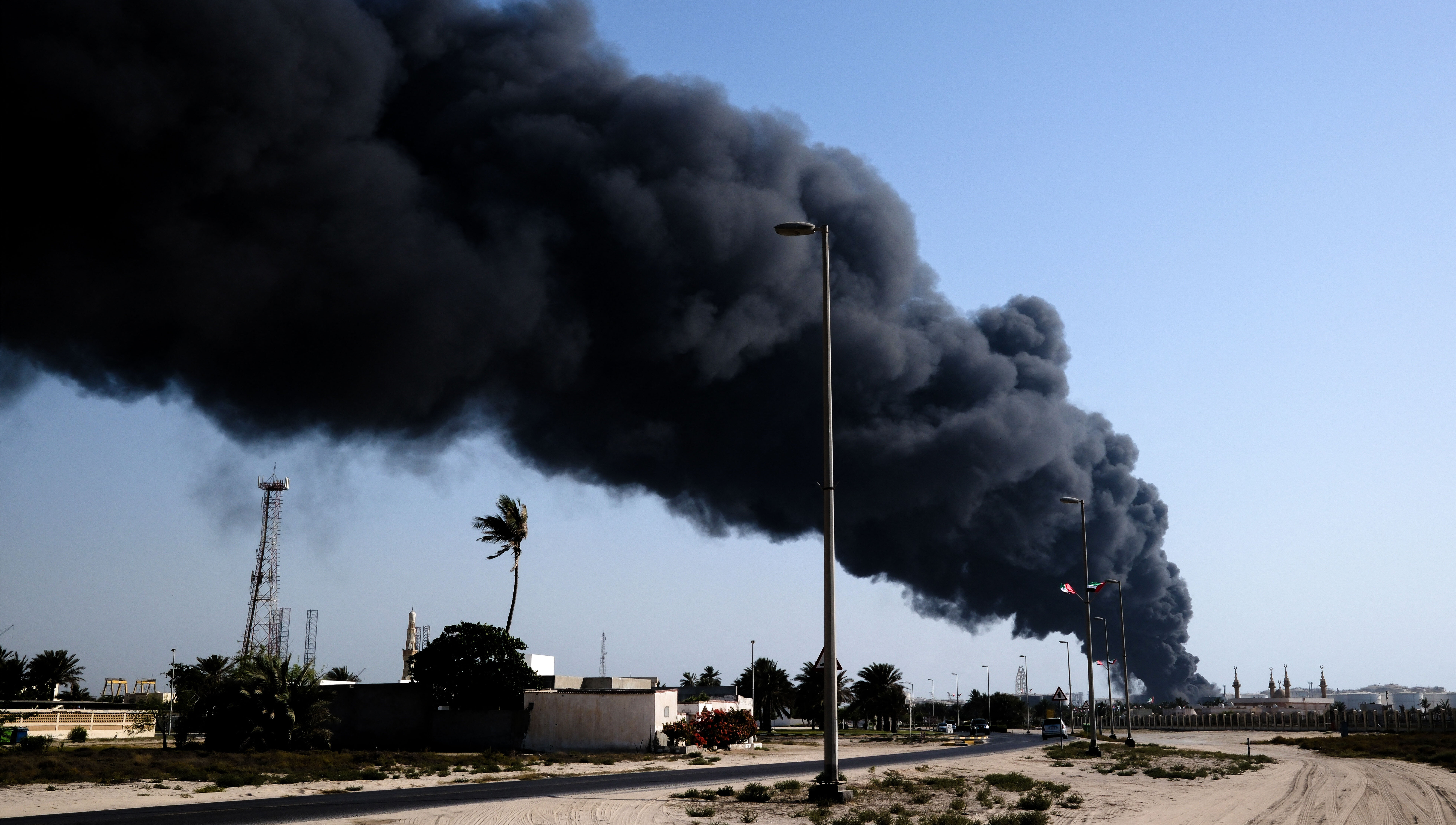 Day in Photos: Fire At Fuel Warehouse, Pink Soup Festival, and Mango Harvest