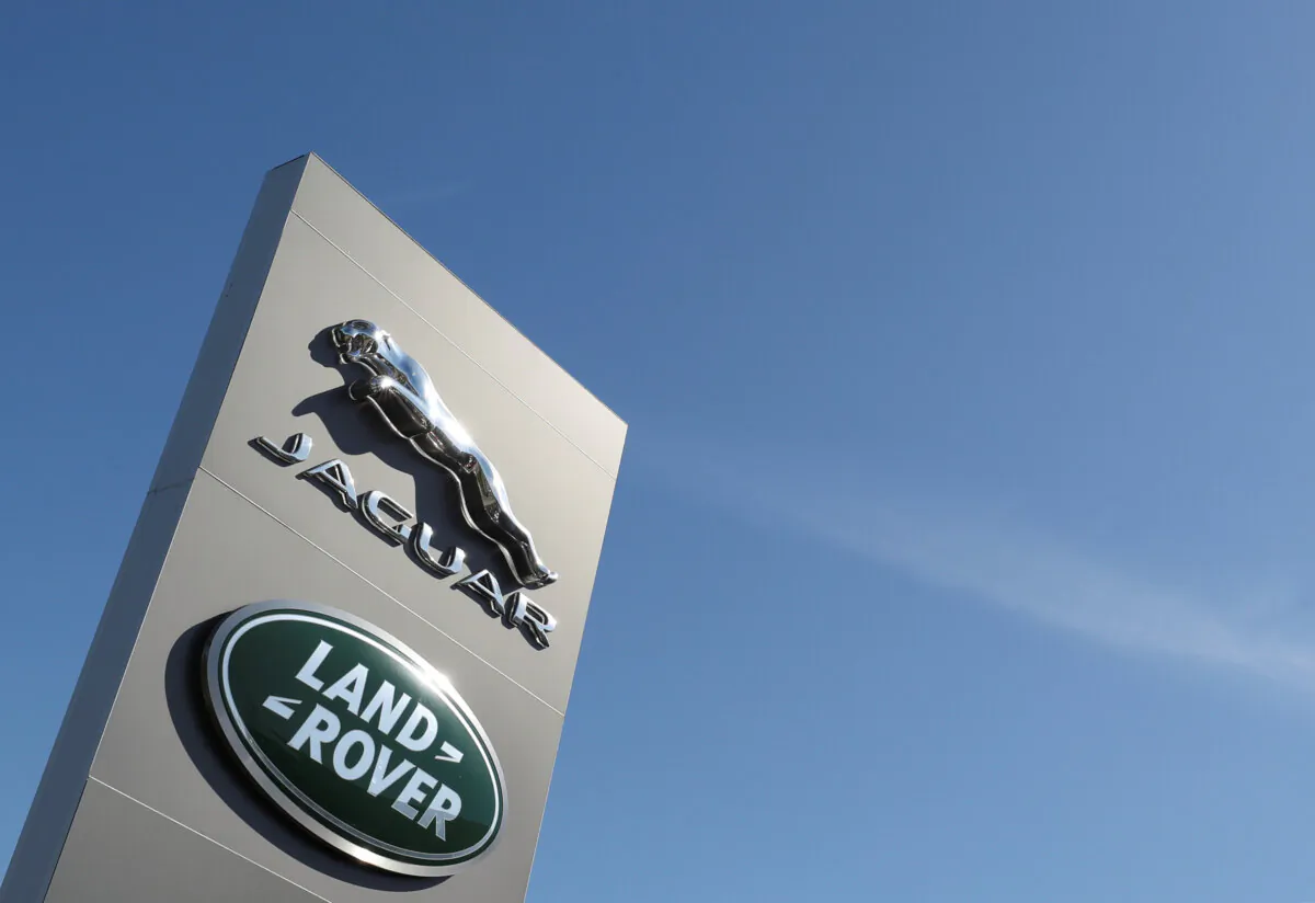 The logos of Jaguar and Land Rover are seen outside a car dealer in Brussels, Belgium, May 28, 2020. (REUTERS/Yves Herman/File Photo)