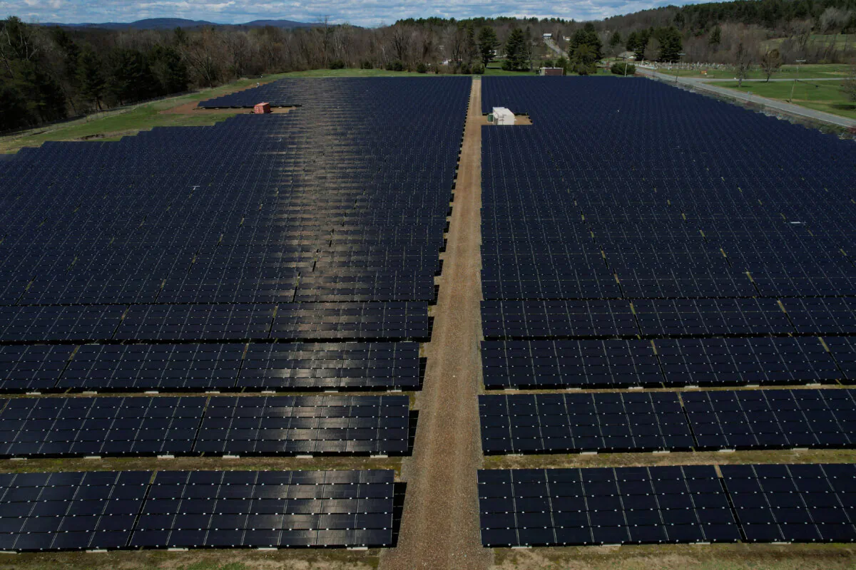 Solar panels are arrayed on Earth Day in Northfield, Mass., on April 22, 2022. (Brian Snyder/Reuters)