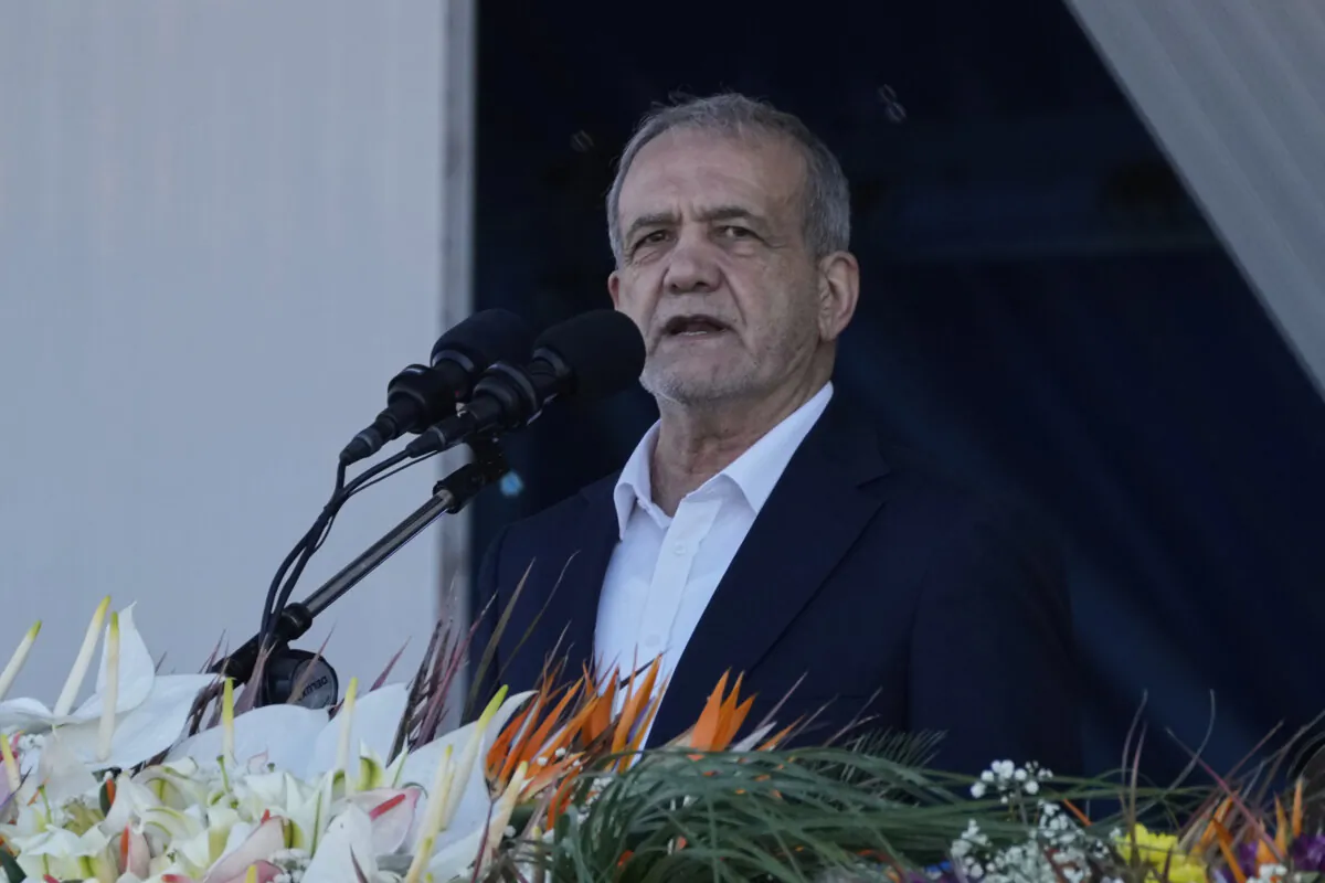 Iranian President Masoud Pezeshkian speaks during the army parade commemorating National Army Day in front of the shrine of the late revolutionary founder Ayatollah Khomeini, just outside Tehran, Iran, on April 18, 2025. (Vahid Salemi/AP)