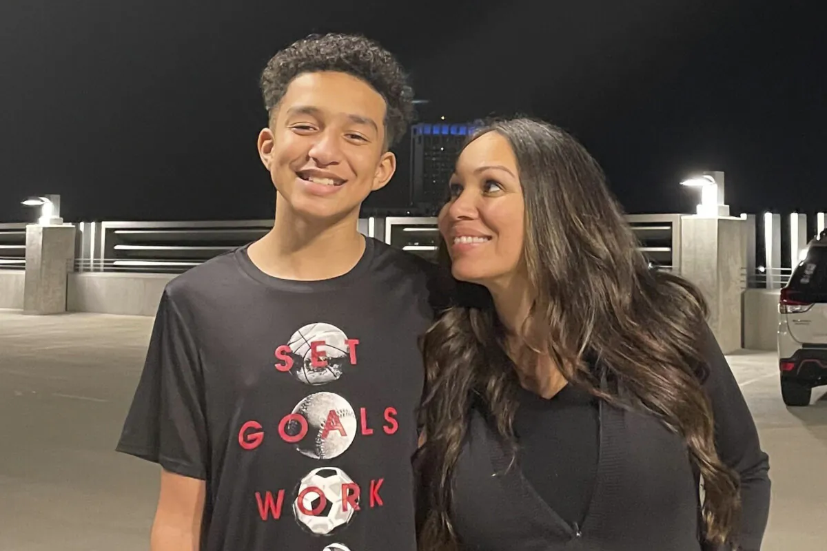 Megan Garcia (R) stands with her son Sewell Setzer III in an undated photo. (Courtesy of Megan Garcia via AP)