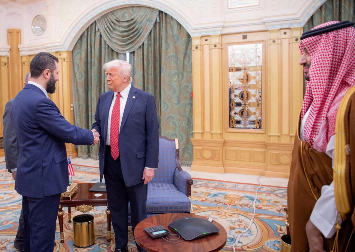 U.S. President Donald Trump meets with Syrian President Ahmed al-Sharaa in Riyadh, Saudi Arabia, in this handout released on May 14, 2025. (Saudi Press Agency/Handout via Reuters /File Photo)