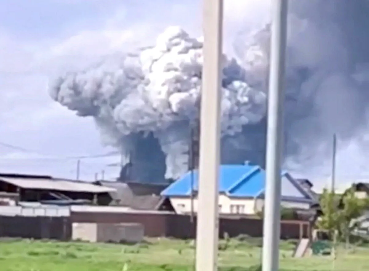 Smoke rises above the area following what local authorities called a drone attack on a military unit in the Sredny settlement, in the Usolsky district of the Irkutsk region, Russia, in this still image from a video published on June 1, 2025. (Governor of Irkutsk Region Igor Kobzev via Telegram/Handout via Reuters)