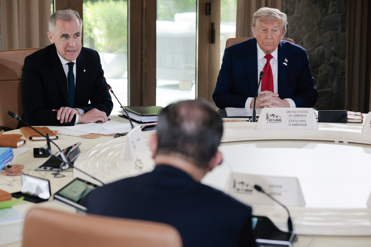 Canadian Prime Minister Mark Carney and U.S. President Donald Trump meet with fellow G7 leaders during a meeting at the G7 Leaders' Summit in Kananaskis, Alta., on June 16, 2025. (Chip Somodevilla/Getty Images)