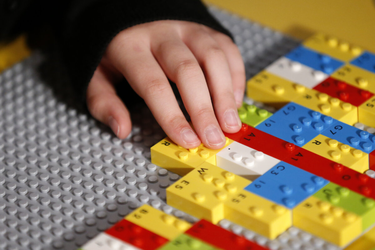 A child plays with LEGO bricks in Melbourne, Australia, on April 15, 2021. (Darrian Traynor/Getty Images)