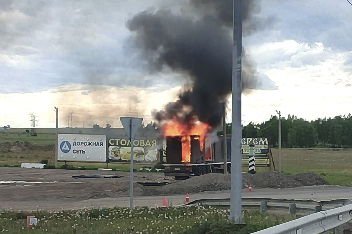 A truck said to have been used to release Ukrainian drones is on fire in the Irkutsk region of Russia, more than 2,500 miles from Ukraine, in a photo released by the Telegram channel of Igor Kobzev, governor of the Irkutsk region, on June 1, 2025. (Governor of Irkutsk region Igor Kobzev's Telegram channel via AP)