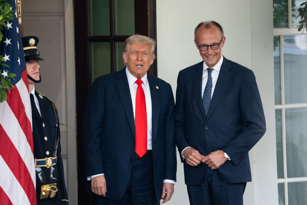 President Donald Trump greets German Chancellor Friedrich Merz at the White House in Washington on June 5, 2025. (Madalina Vasiliu/The Epoch Times)