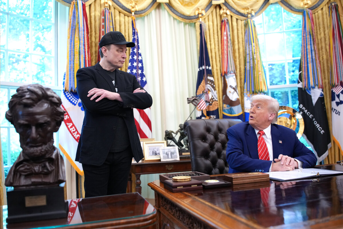 President Donald Trump, joined by Tesla CEO Elon Musk (L), speaks to reporters in the Oval Office of the White House on May 30, 2025. (Kevin Dietsch/Getty Images)