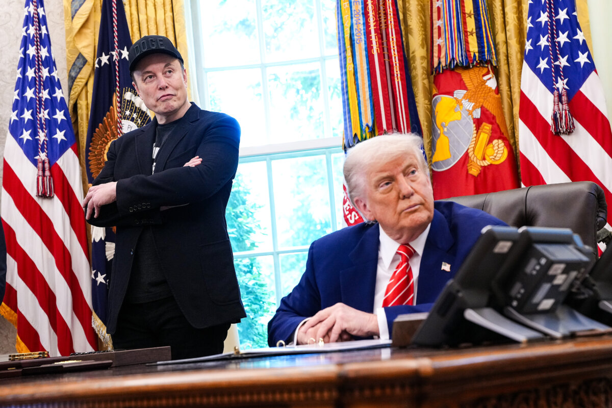 Elon Musk and President Donald Trump listen to a question from reporters in the Oval Office of the White House in Washington, DC on May 30, 2025. ( Kevin Dietsch/Getty Images)