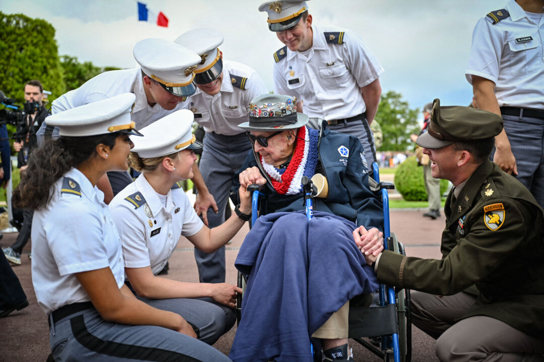 NextImg:Day in Photos: D-Day Landing Anniversary, ICE Detention, and Train Strike