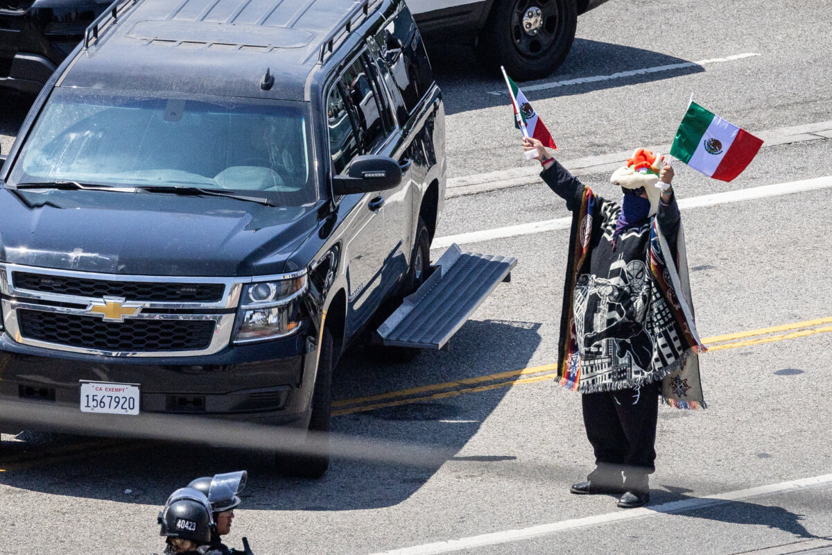 A protester taunts police in Los Angeles on June 8, 2025. (John Fredricks/The Epoch Times)
