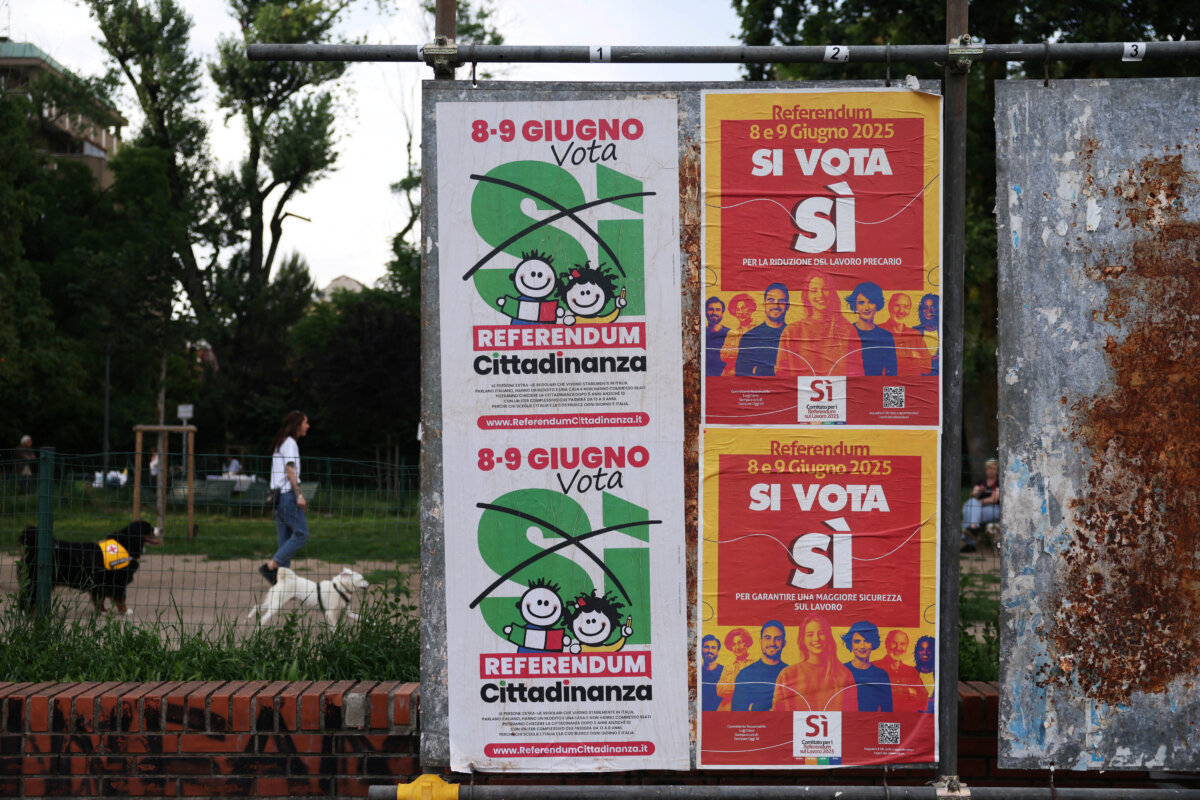 Posters of referendums on employment and Italian citizenship, in Milan, Italy, June 4, 2025. (Reuters/Claudia Greco)