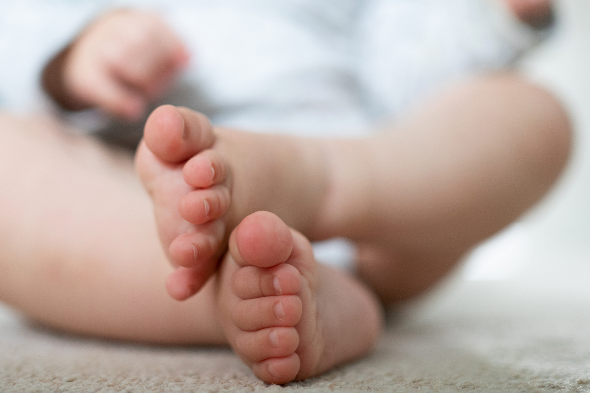 File photo of a baby playing with toys at home in Northamptonshire, England, on Aug. 4, 2023. (Joe Giddens/PA Wire)