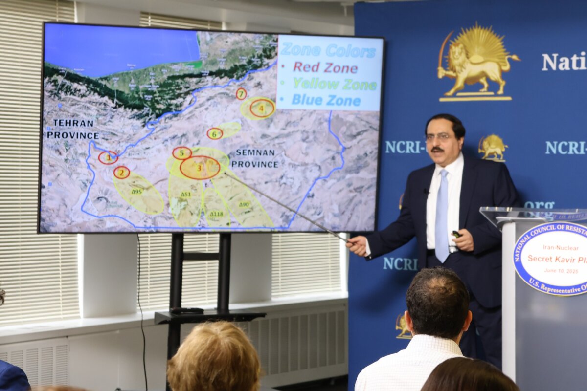 The deputy director of the National Council of Resistance of Iran, Alireza Jafarzadeh, points at a map of Iran during a press conference in Washington on June 10, 2025. (Courtesy of NCRI)