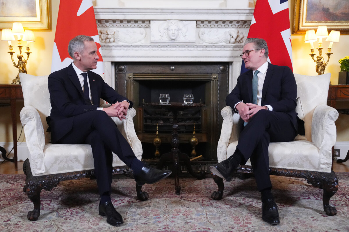 Prime Minister Mark Carney meets with British Prime Minister Keir Starmer as he arrives in London on March 17, 2025. (The Canadian Press/Sean Kilpatrick)