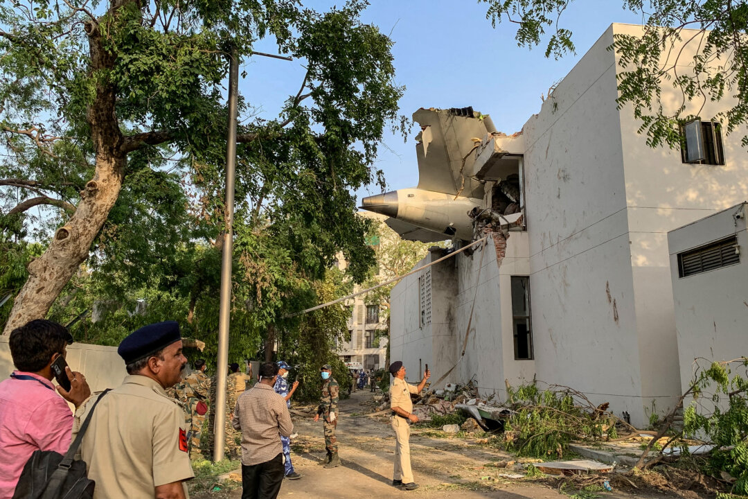 NextImg:Day in Photos: India Plane Crash, London’s Personalized Museum, and Flooding in San Antonio