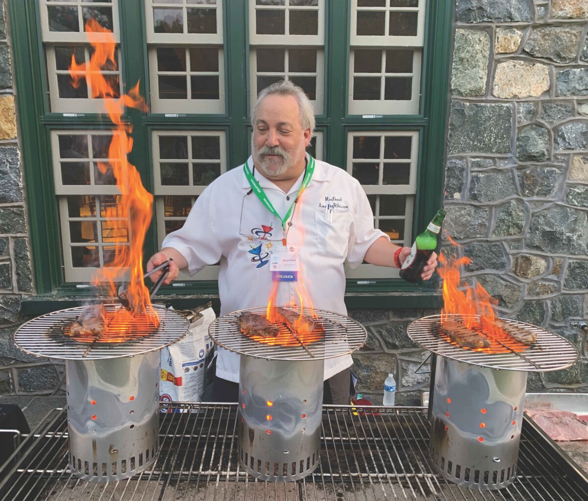 Meathead sears ribeyes over three hot charcoal chimneys, an innovation he calls the afterburner method. (AmazingRibs.com)