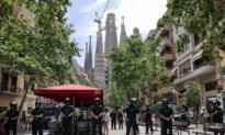 Day in Photos: Protests in Spain, First Veterans Day in Germany, Iran-Israel Strikes Continue