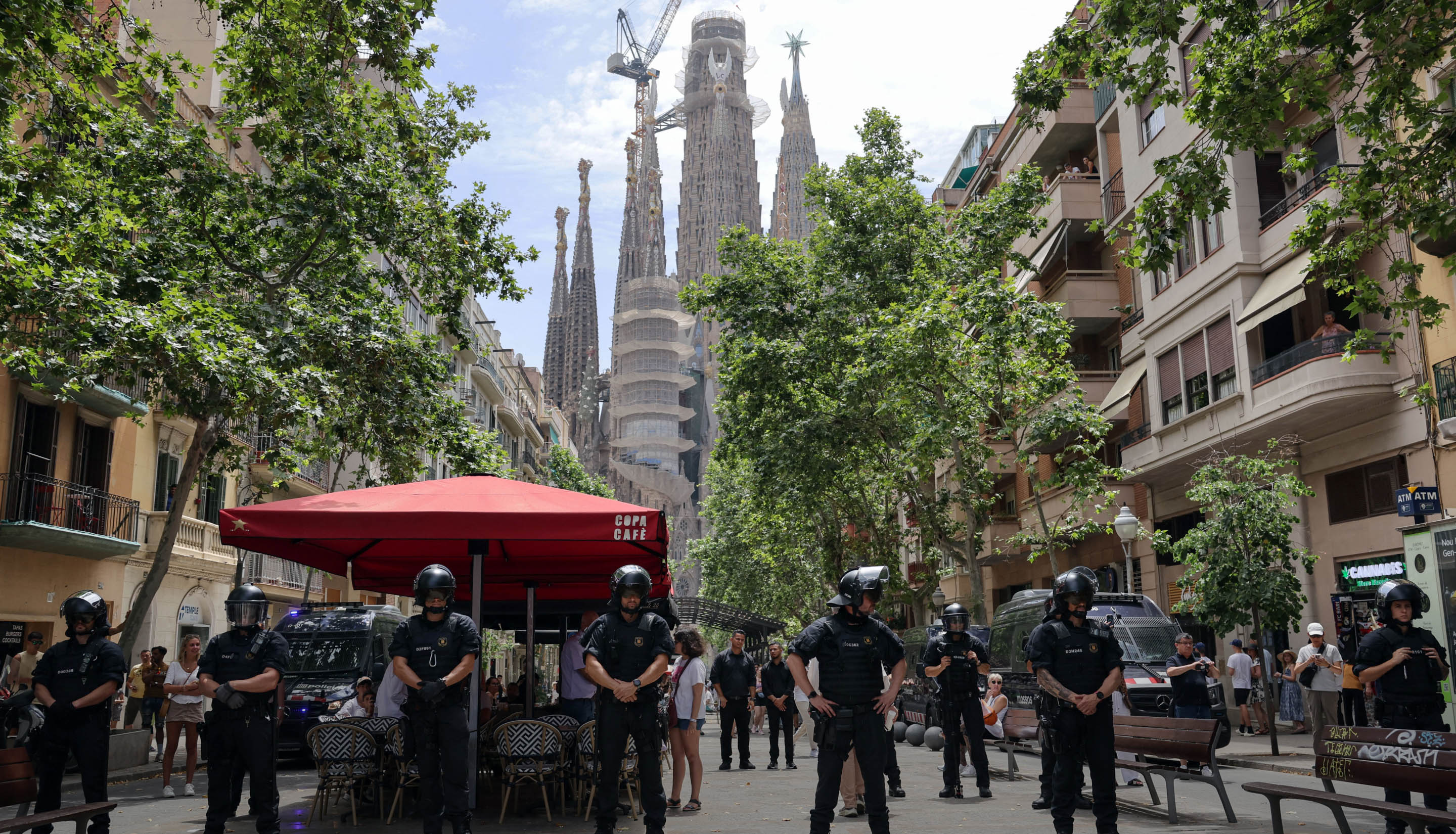 Day in Photos: Protests in Spain, First Veterans Day in Germany, Iran-Israel Strikes Continue