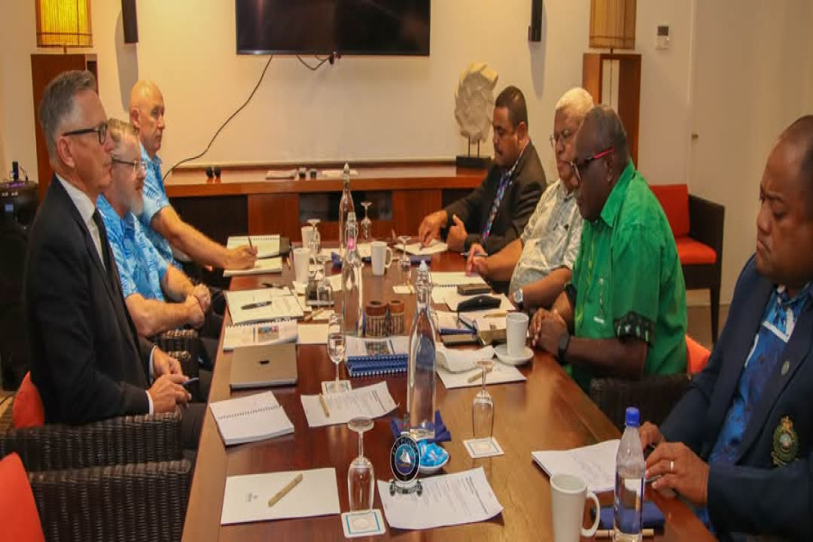 The AFP team responsible for a review of Fiji's police - including Australian Federal Police Assistant Commissioner Nigel Ryan and consultant Mike Bush - meet with senior Fijian officers.