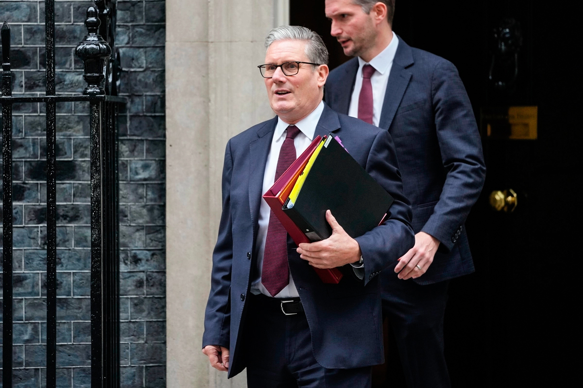 British Prime Minister Keir Starmer leaves 10 Downing Street in London on June 11, 2025. (AP Photo/Kin Cheung)