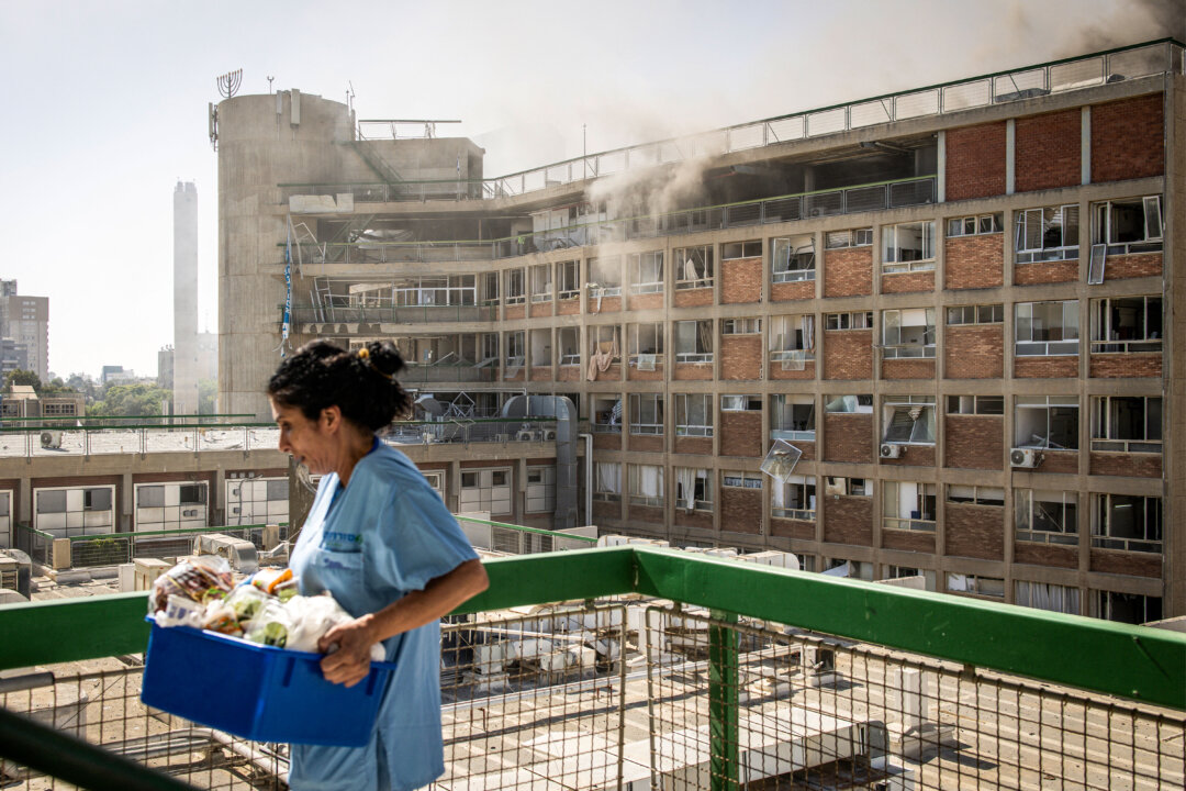 Day in Photos: Attack on Hospital in Israel, Hurricane Erick, and Heat in Europe