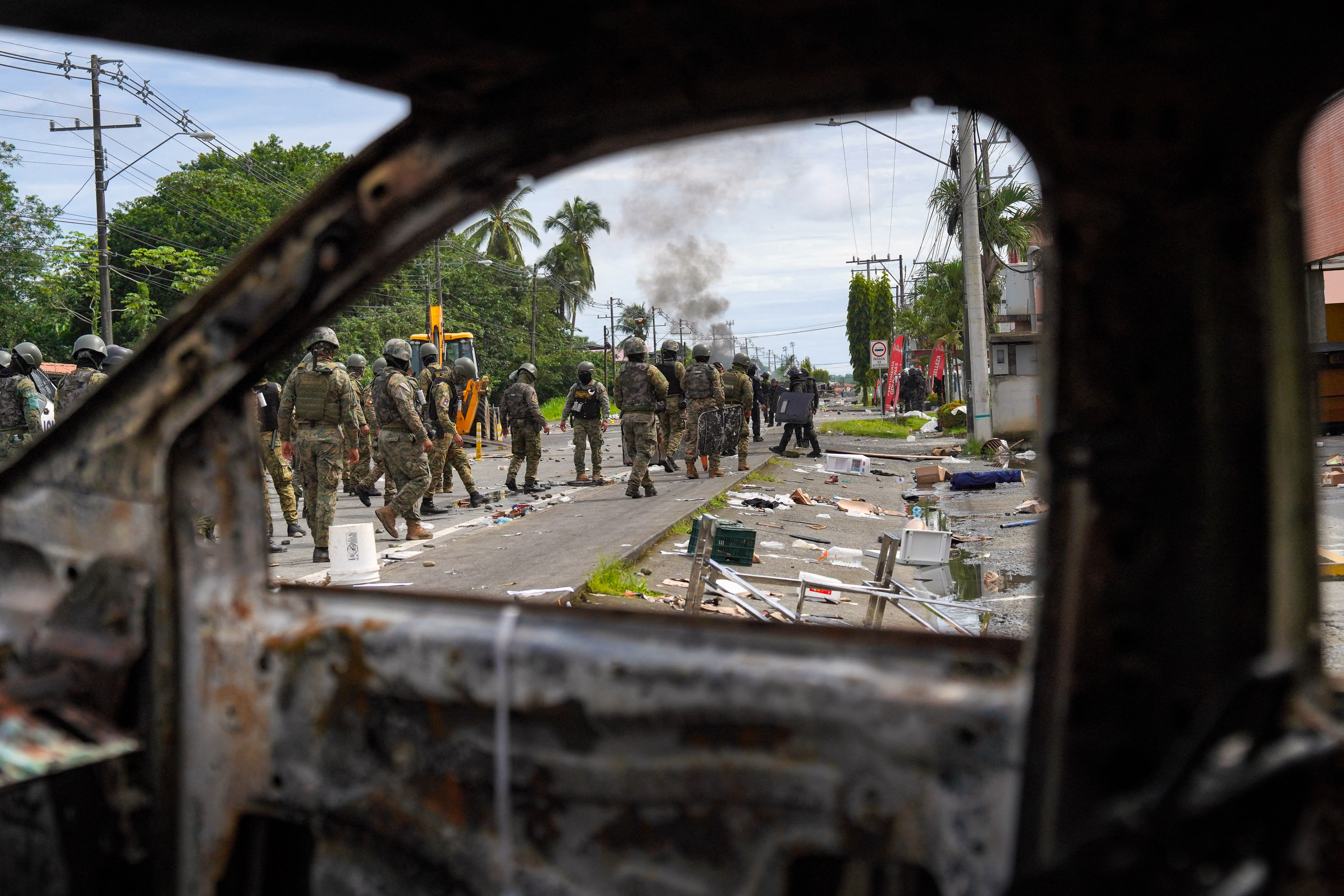 Day in Photos: Iran Strikes Israel, Church Shooting, Protests in Panama
