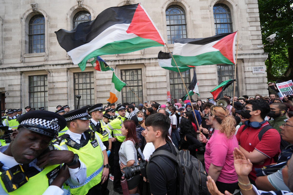 Police block the way of people taking part in a demonstration in central in London in support of Palestine Action on June 23, 2025. (Lucy North/PA)