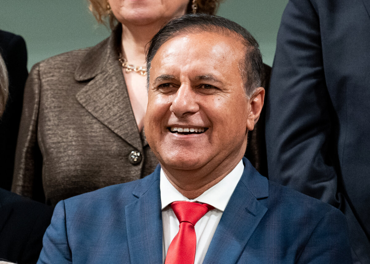 Treasury Board President Shafqat Ali participates in a family photo following a cabinet swearing in ceremony at Rideau Hall in Ottawa on May 13, 2025. (The Canadian Press/Spencer Colby)