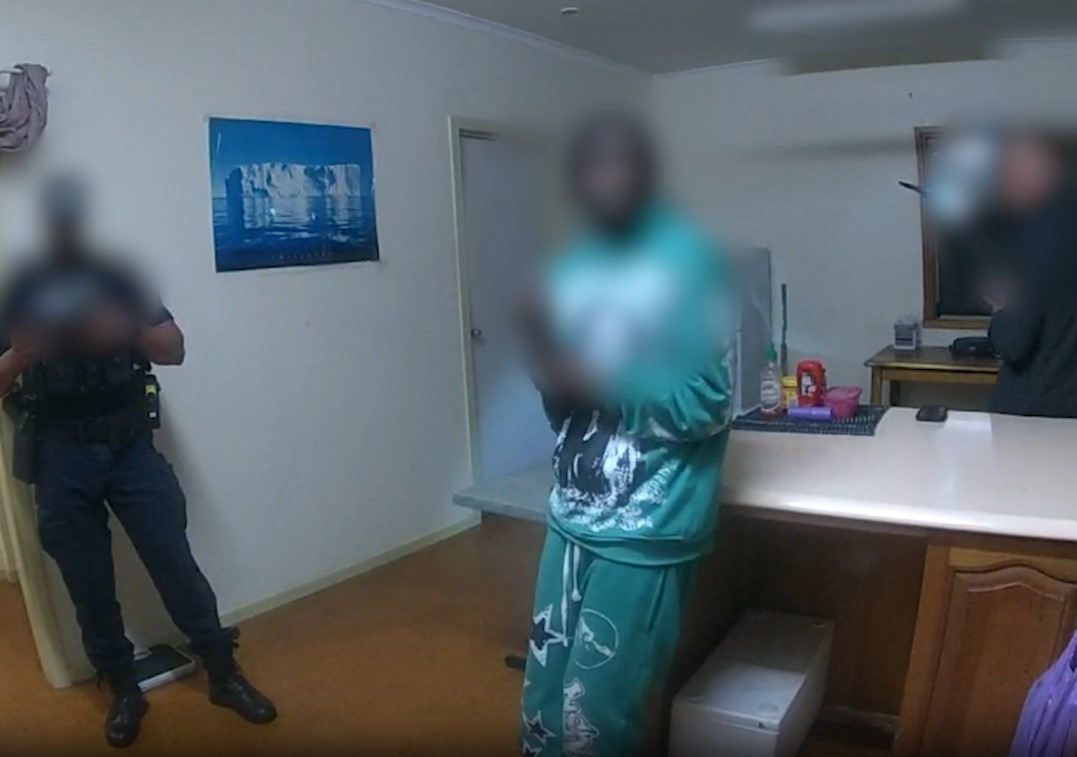 A still from a video of police arresting Echibaketa Byamungu. (Courtesy of Queensland Police Service)