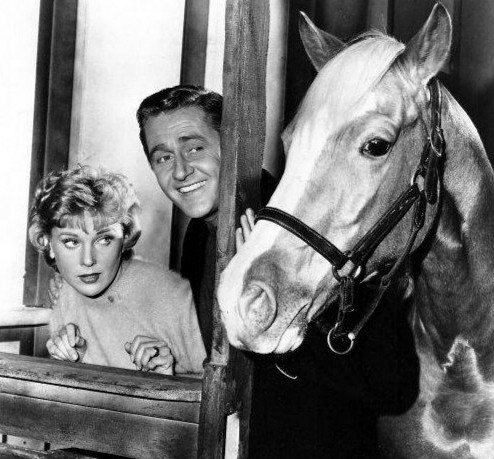 “Mister Ed” stars Connie Hines as Carole Post, and Alan Young as Wilbur Post, in an undated photo. (Public Domain)